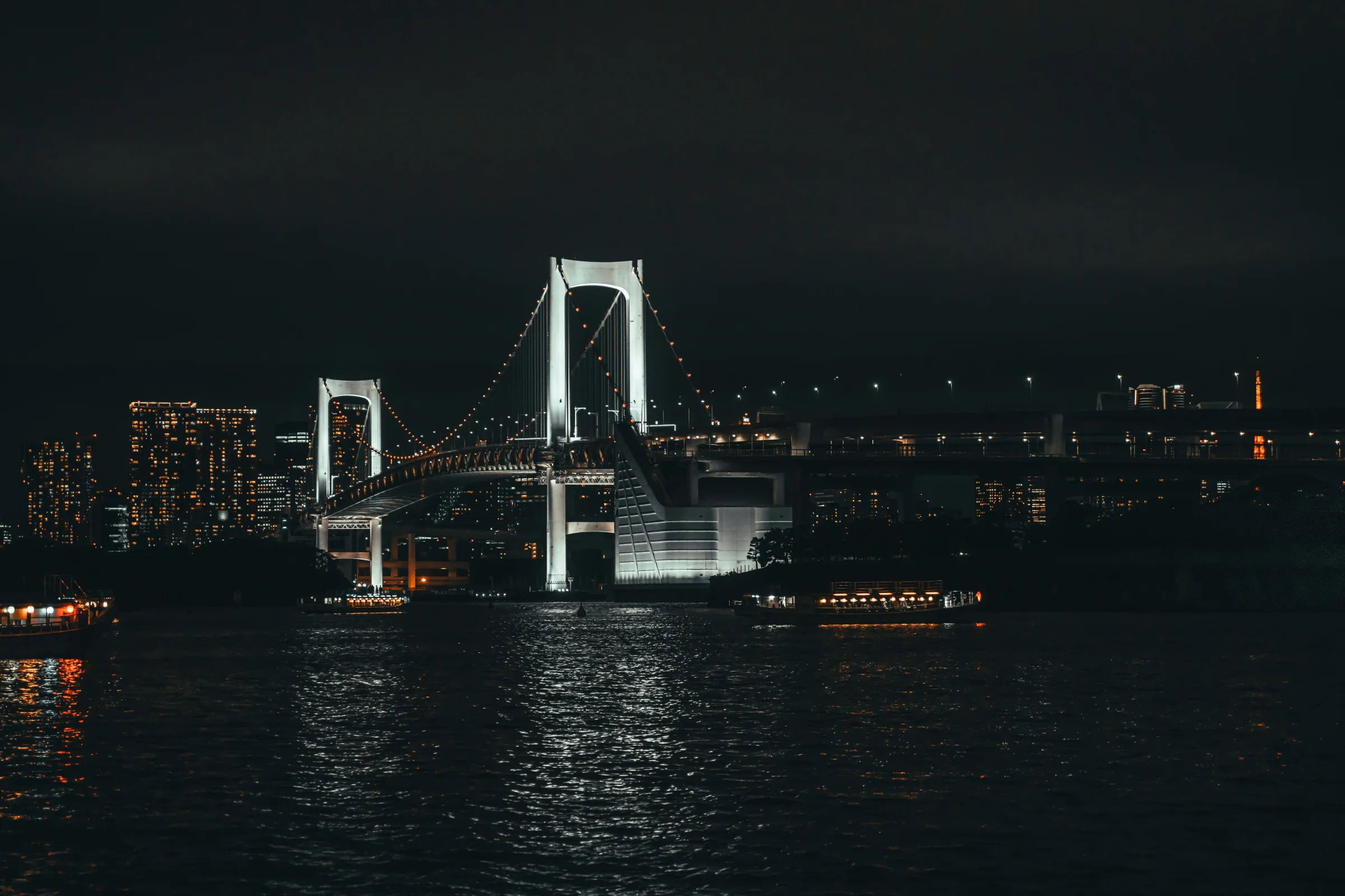 Waterfront cityscape of Aomori, Japan with harbor lights at dusk