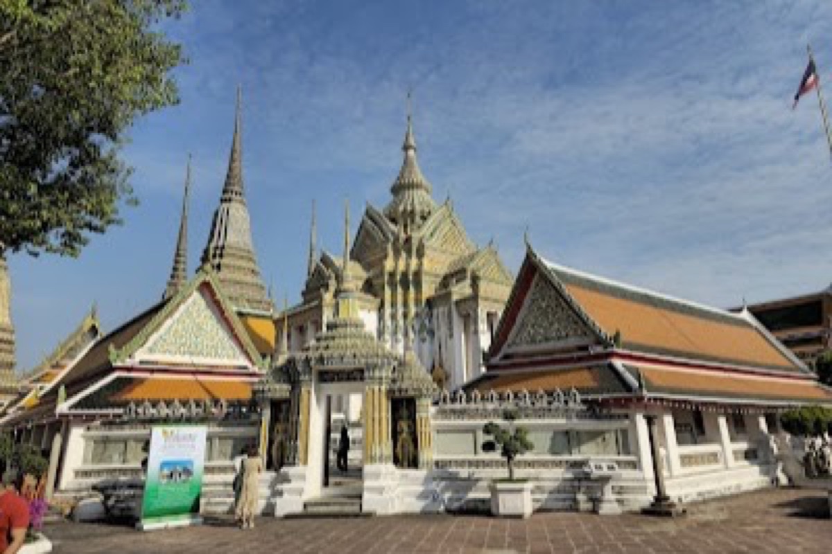 Wat Pho Reclining Buddha statue with gold leaf and mother-of-pearl inlay feet