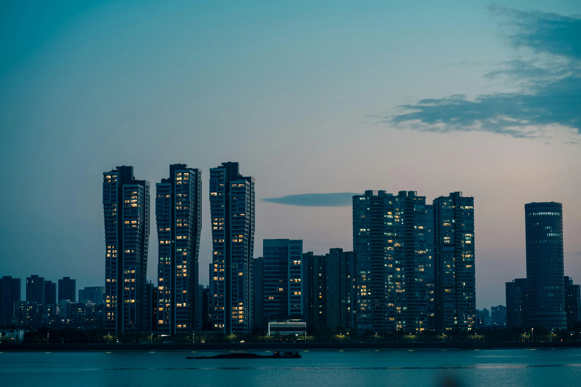 Dusk view of Changchun city skyline and modern street scene in China