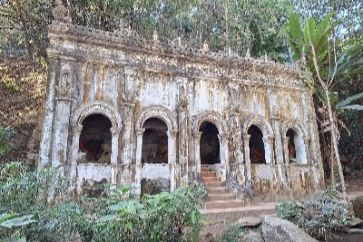 Jungle footpath of the Monk's Trail winding up to the forest temple of Wat Pha Lat