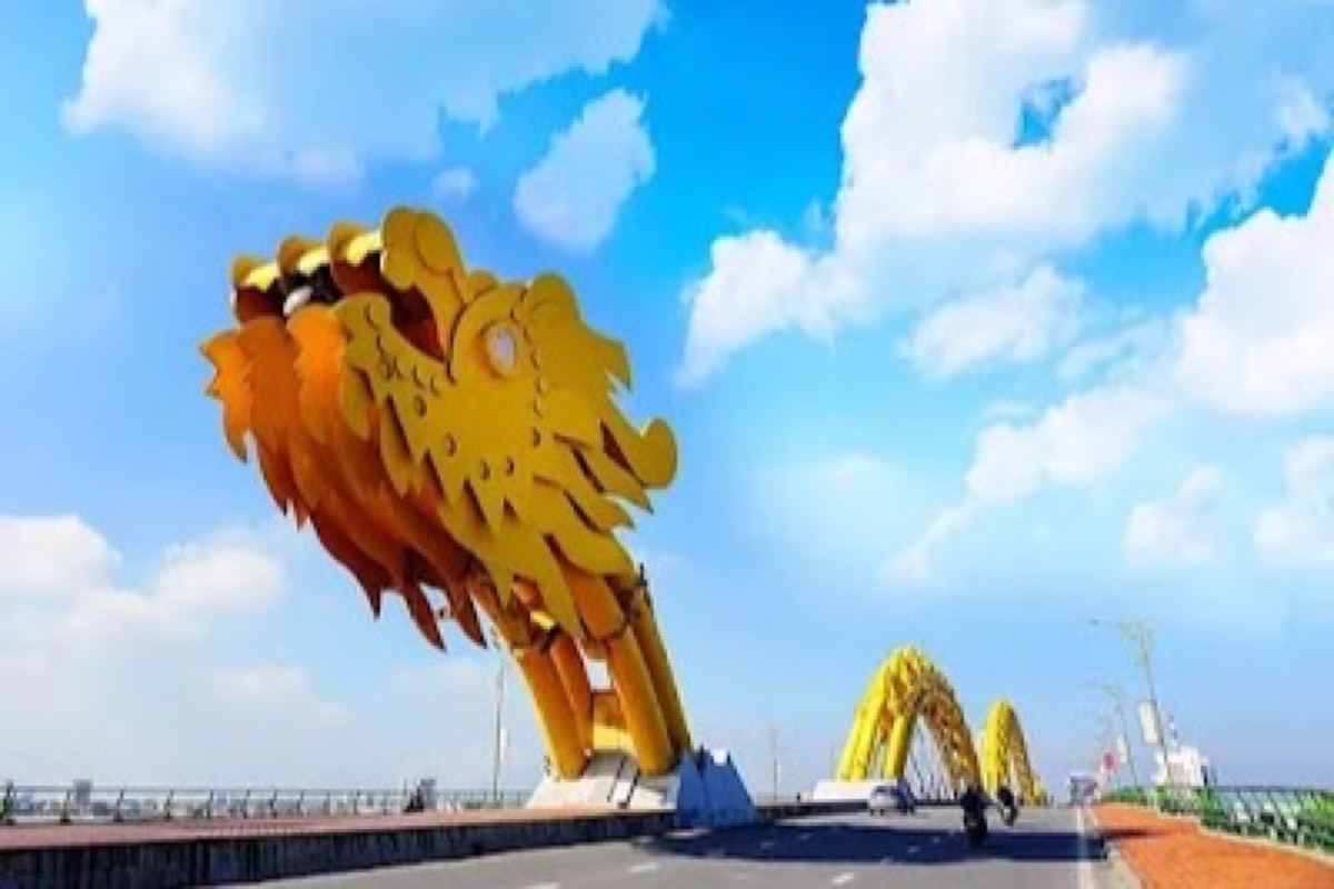 Dragon Bridge glowing over the Han River during the weekend fire show in Da Nang