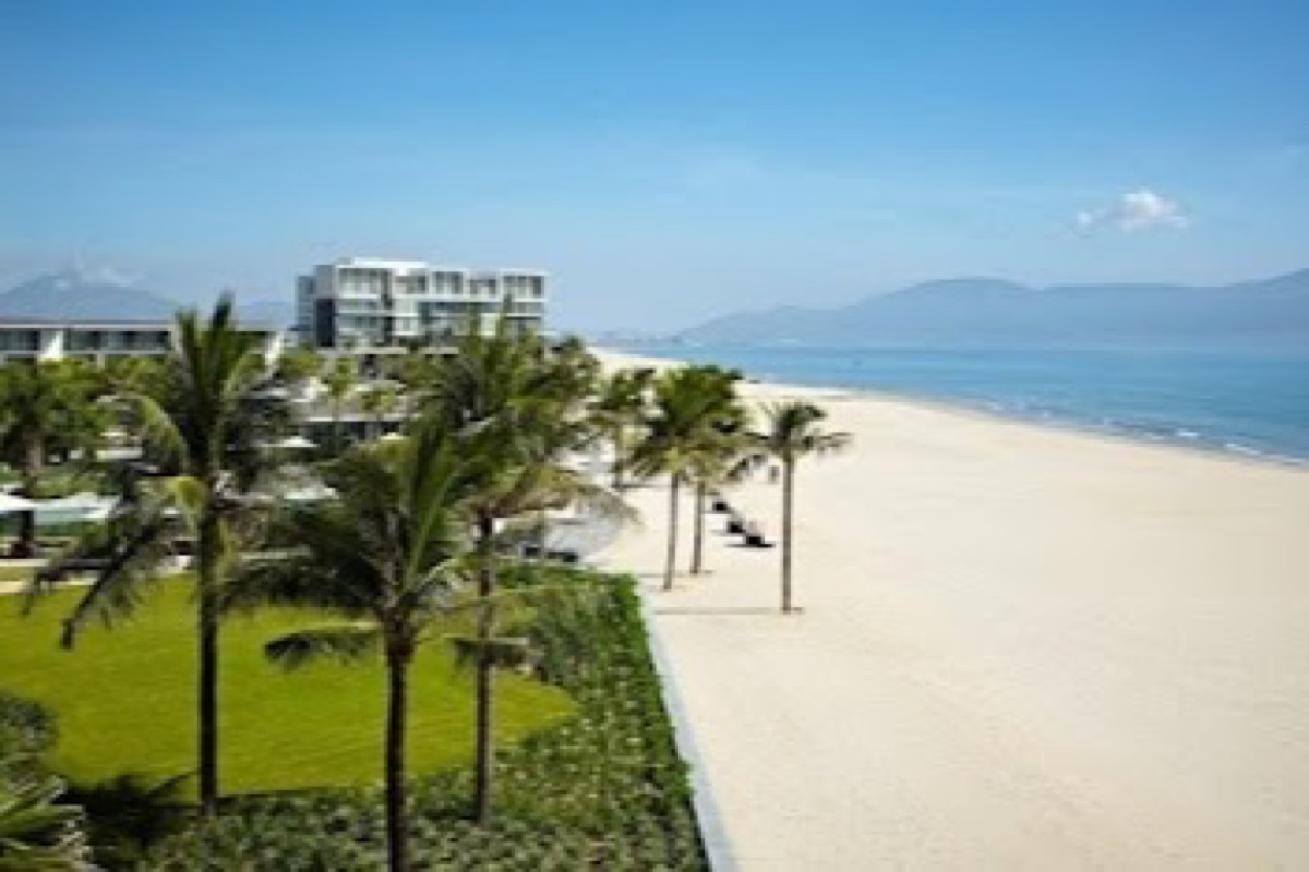Non Nuoc Beach shoreline with the Marble Mountains rising behind in Da Nang