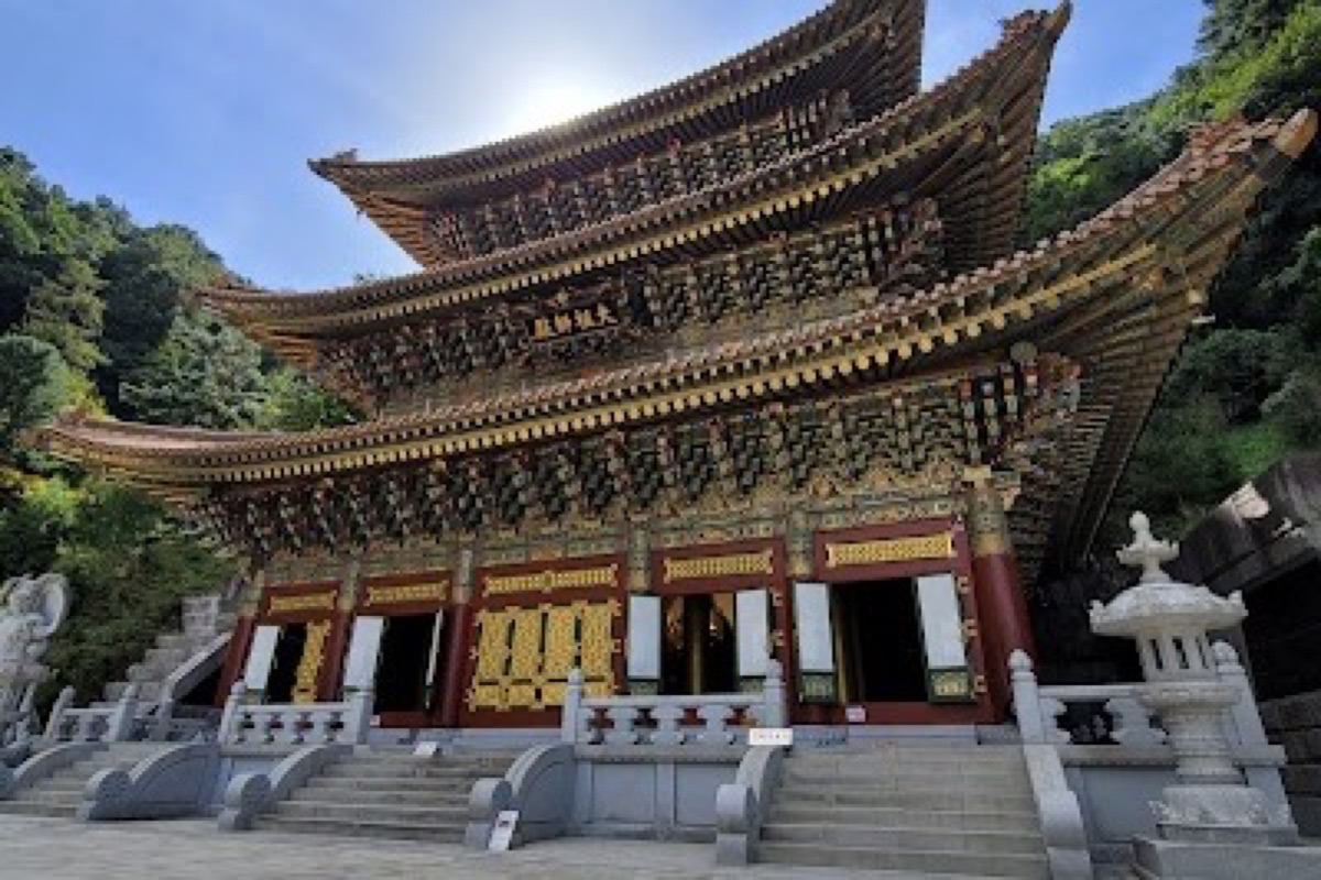 Guinsa Temple terraced Cheontae Order halls cascading down Sobaeksan amid autumn foliage in Danyang