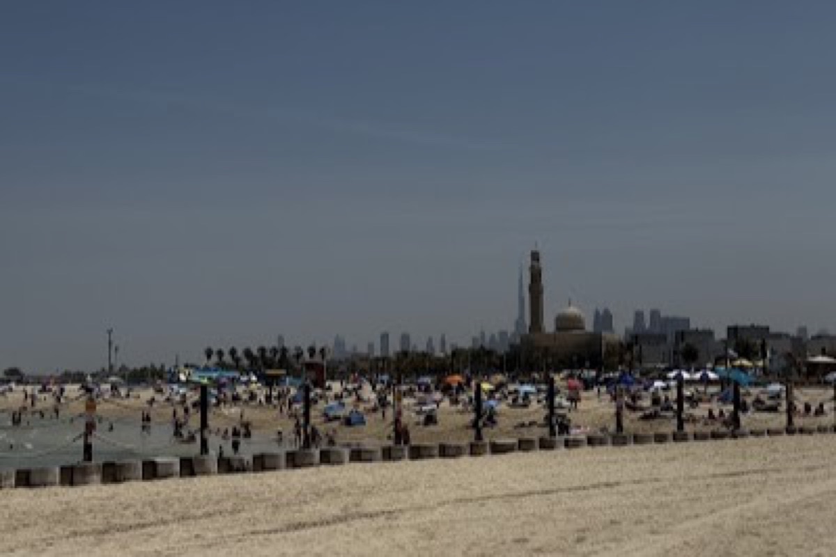 White-sand Jumeirah Public Beach with Burj Al Arab on the horizon