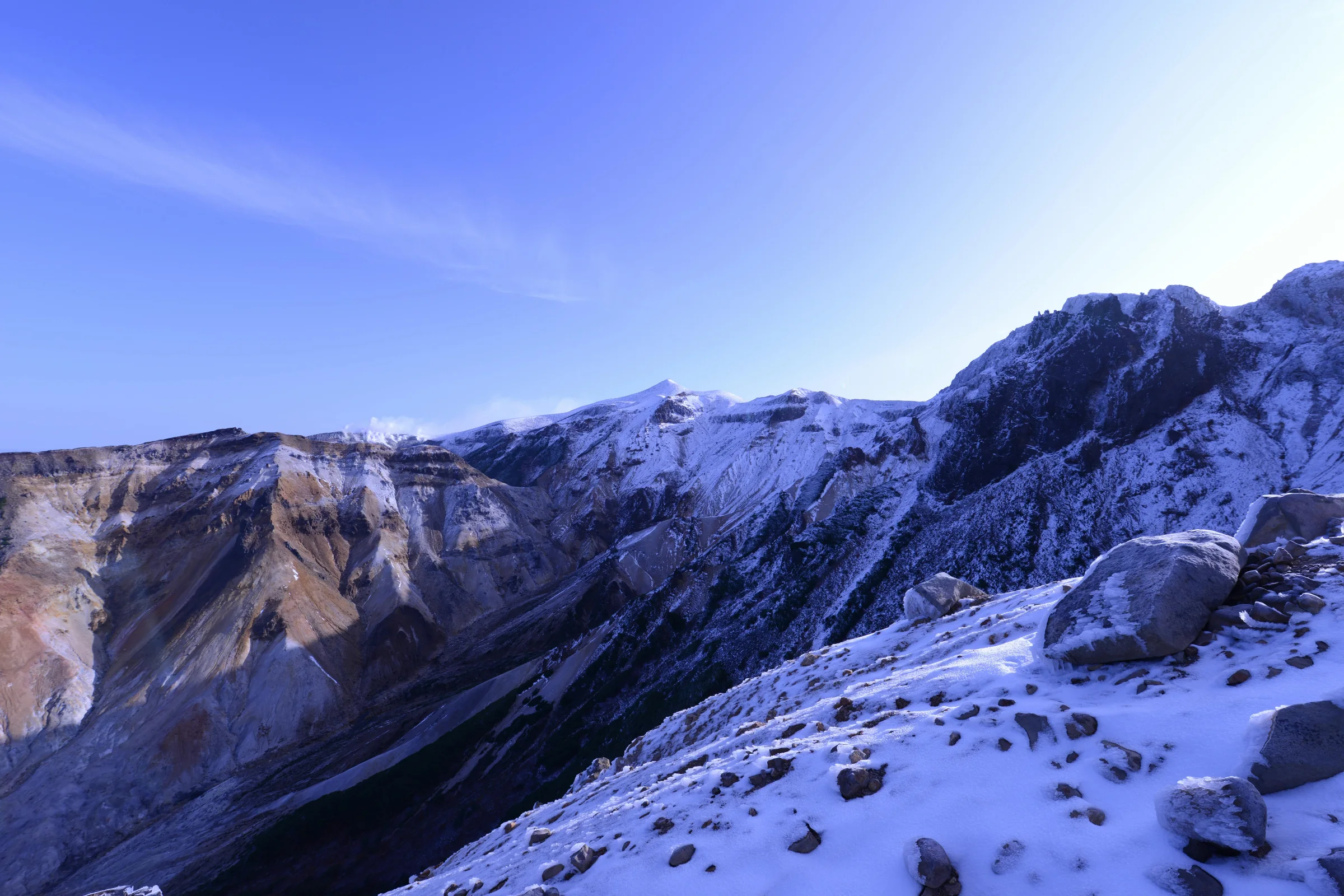 Panoramic view of Furano lavender fields with mountains in Hokkaido, Japan