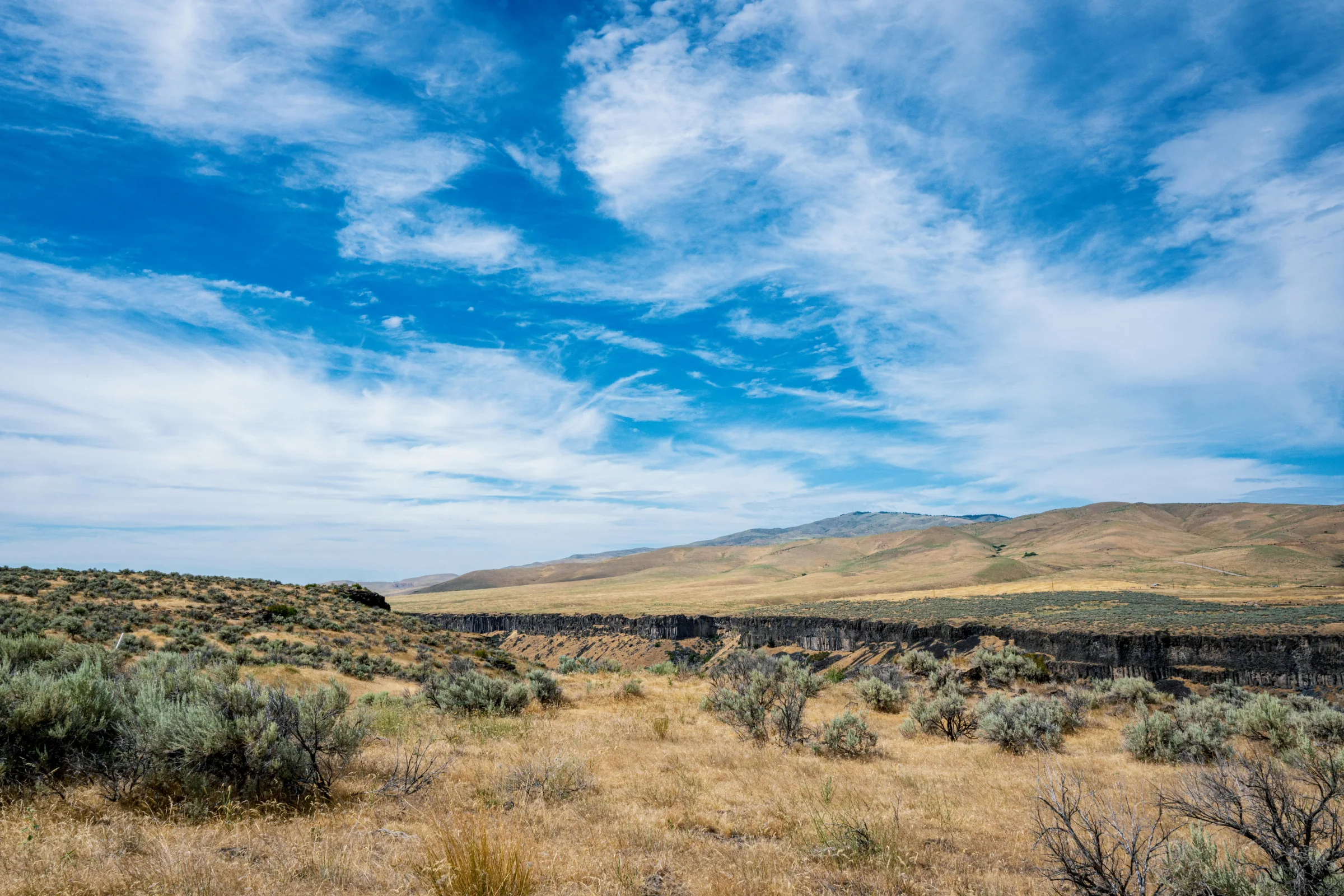 Hero image of Great Basin National Park mountains and desert landscape at sunset in Nevada.