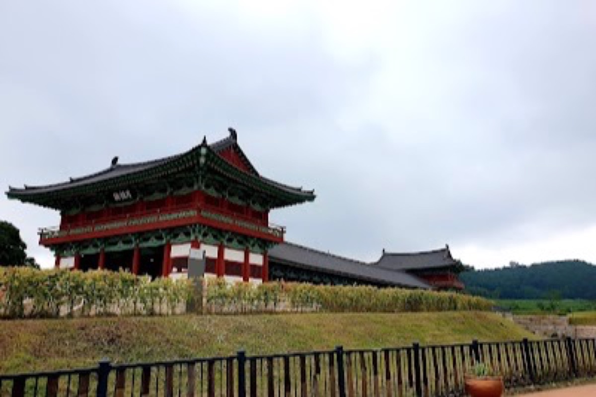 Donggung Palace and Wolji Pond with illuminated pavilions reflected in still water at night in Gyeongju