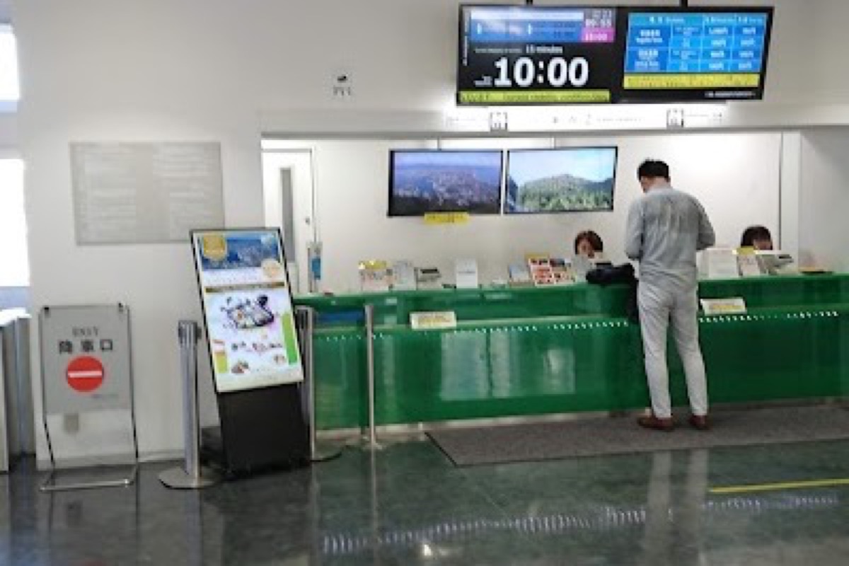 Mount Hakodate Ropeway gondola ascending toward the summit at dusk