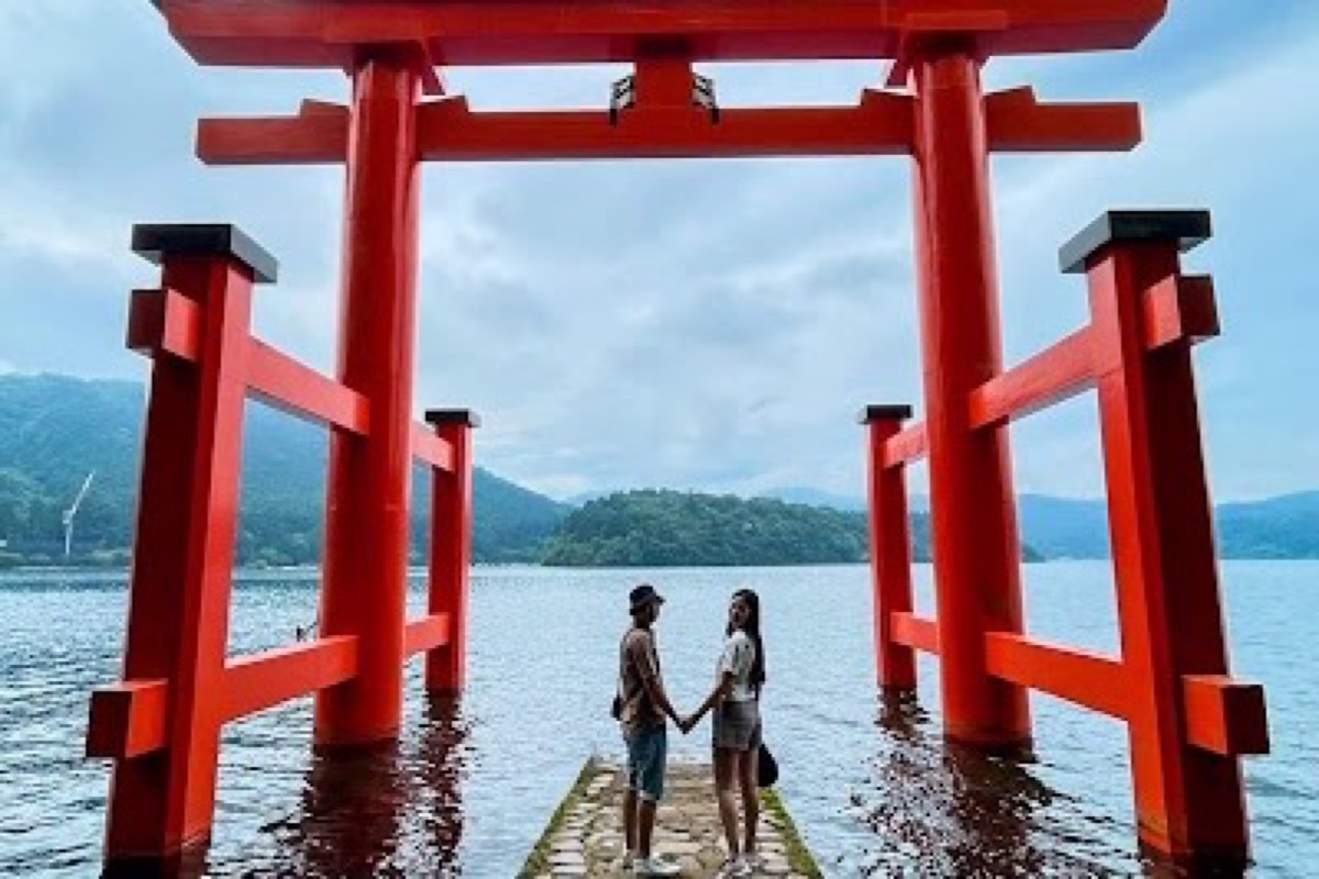Heiwa no Torii gate rising from Lake Ashi waters at Hakone Shrine