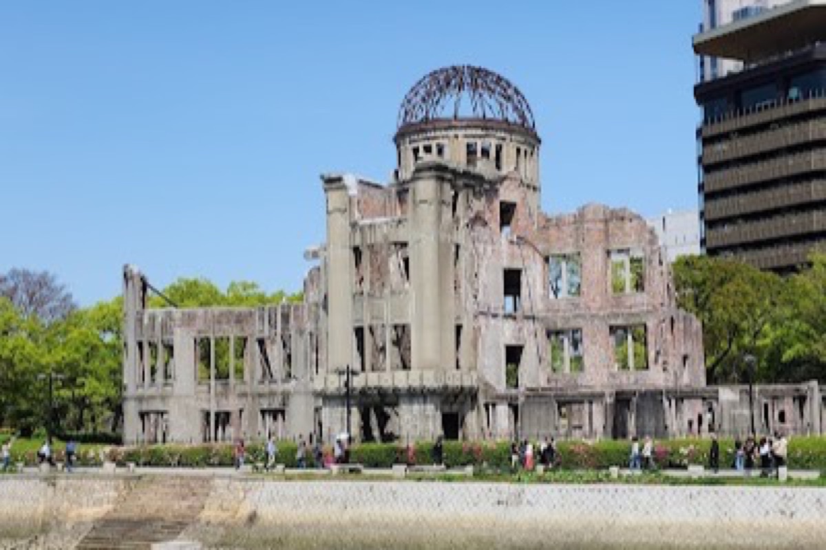 Atomic Bomb Dome preserved ruins at sunrise in Hiroshima Peace Memorial Park