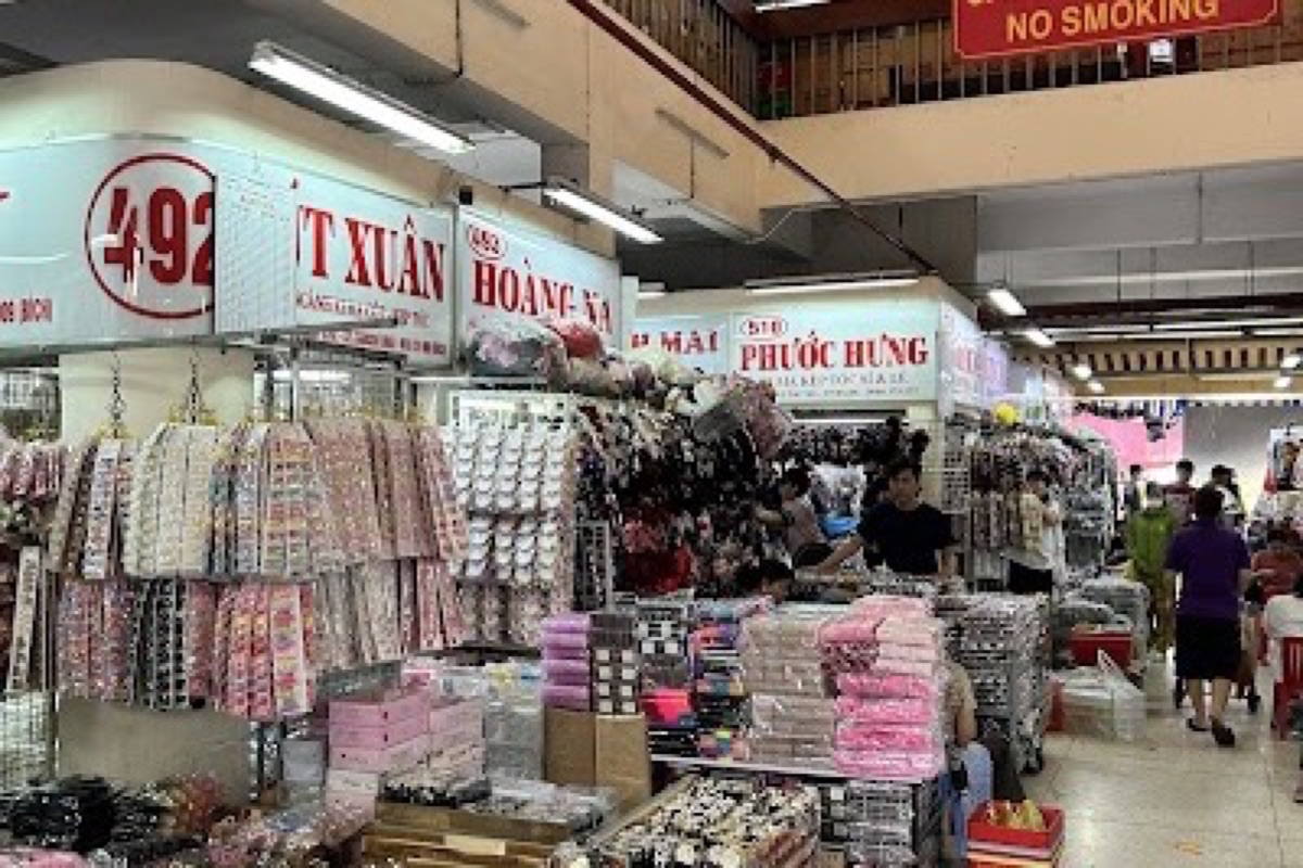 Binh Tay Market tile-roofed courtyard and lantern stalls in Cho Lon