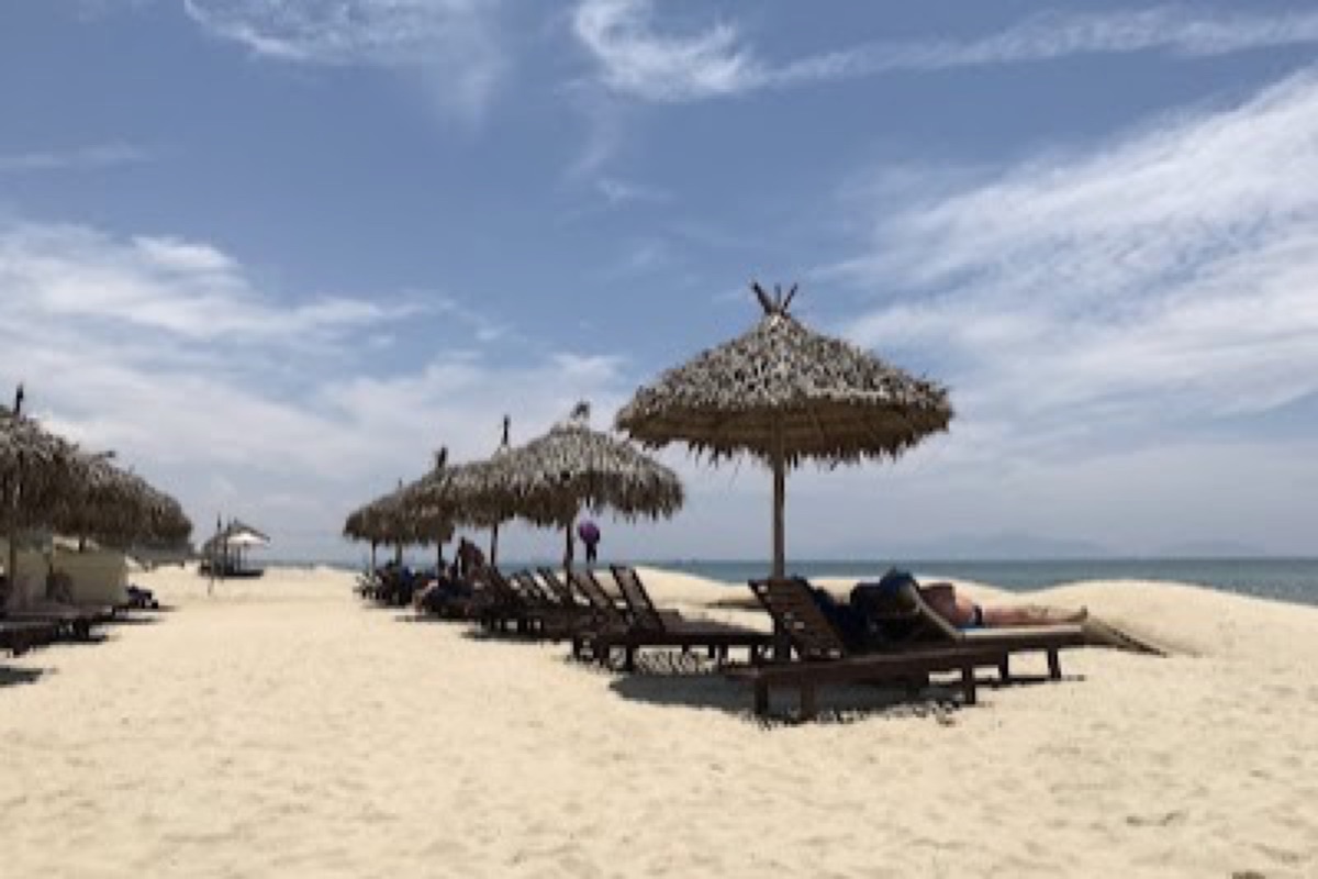 An Bang Beach shoreline with loungers and beach clubs outside Hoi An