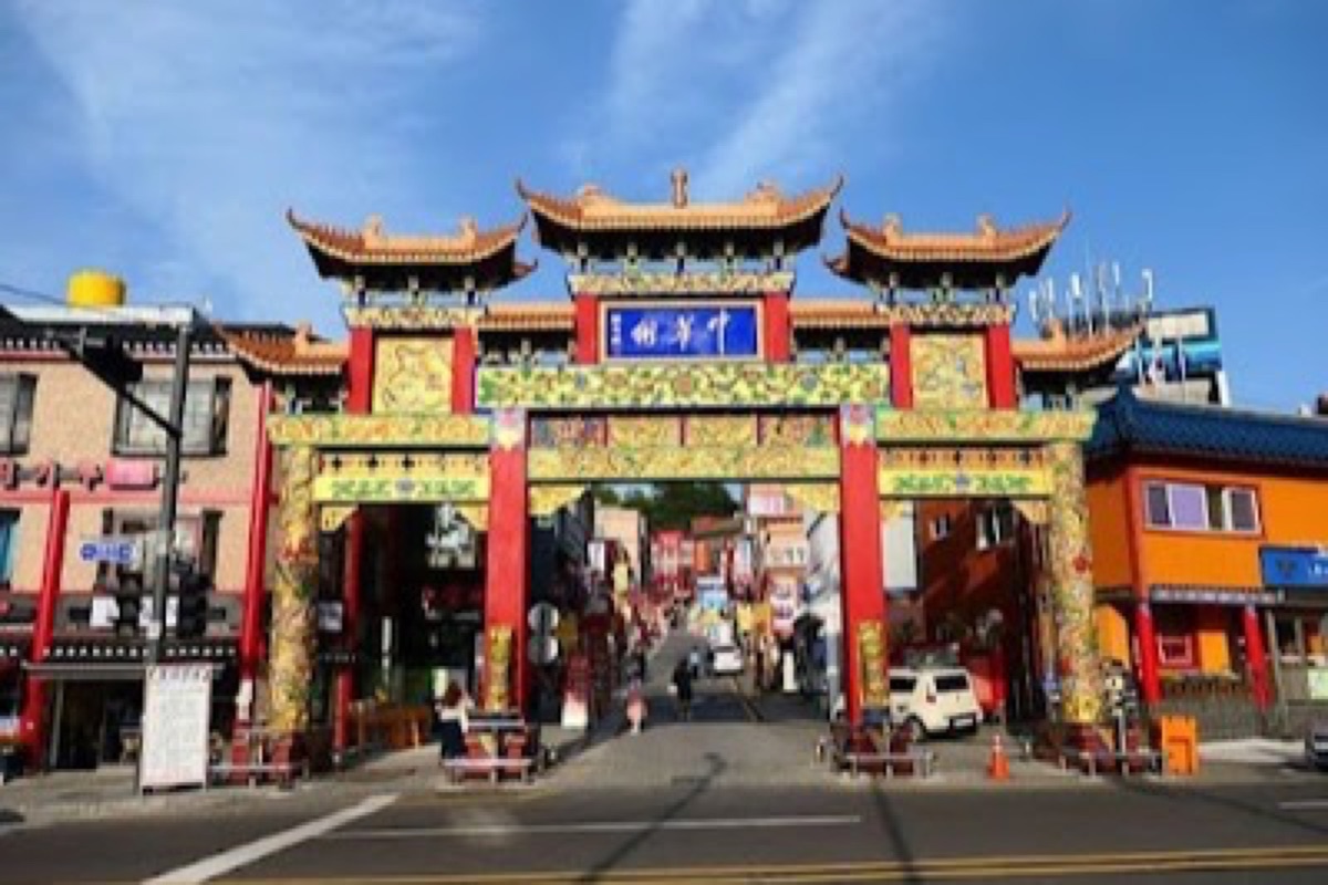 Incheon Chinatown red paifang gates and Chinese-Korean restaurant street in Jung-gu