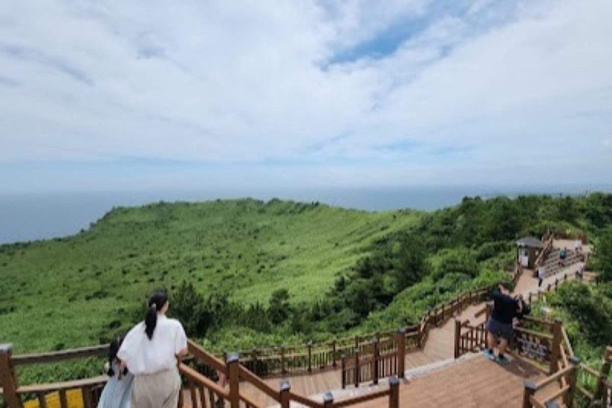 Seongsan Ilchulbong volcanic crater bowl at sunrise on Jeju's east coast