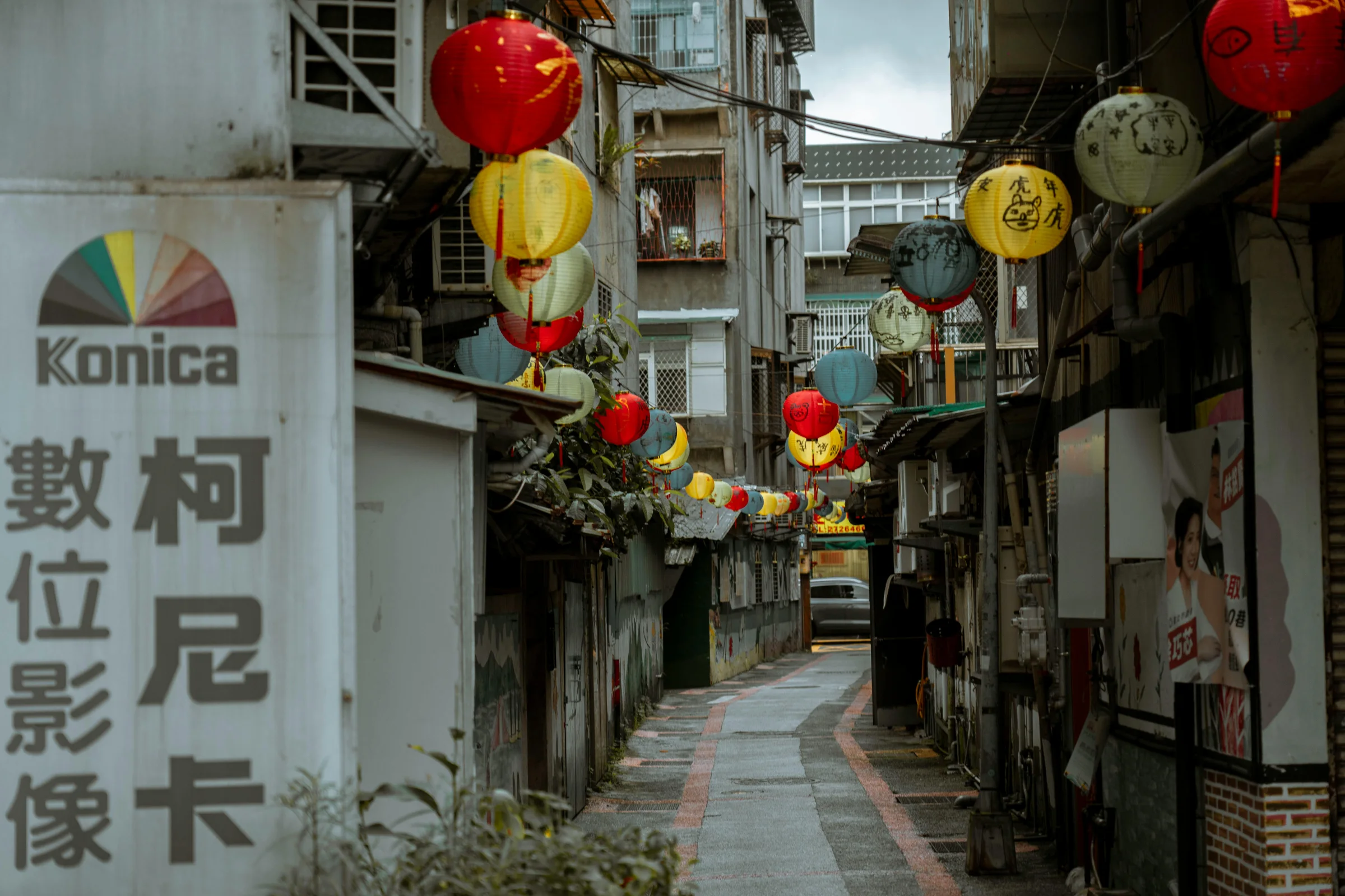 Traditional Chinese old town street at night with lanterns and market stalls