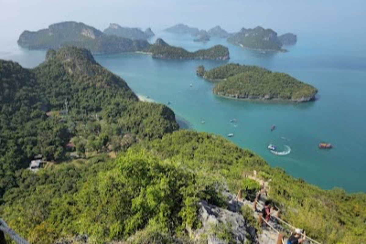 Limestone karsts of Ang Thong National Marine Park rising from emerald water
