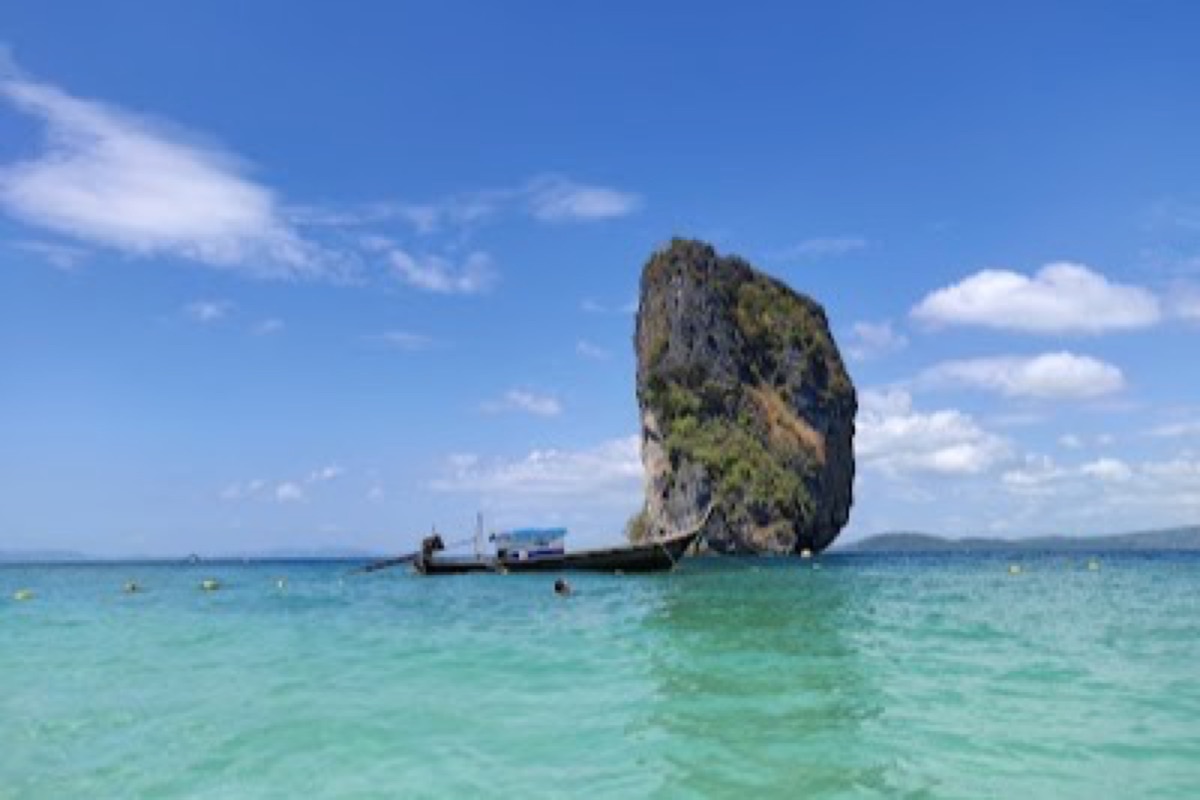 Powder-white sandbar curling into turquoise water on Koh Poda island near Krabi