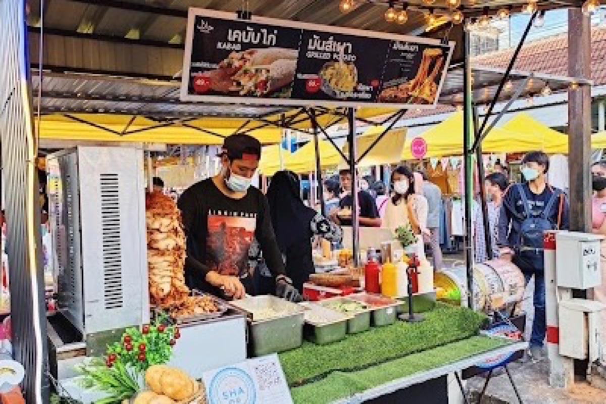 Lantern-lit stalls and grilled seafood smoke along the Krabi Town Walking Street night market