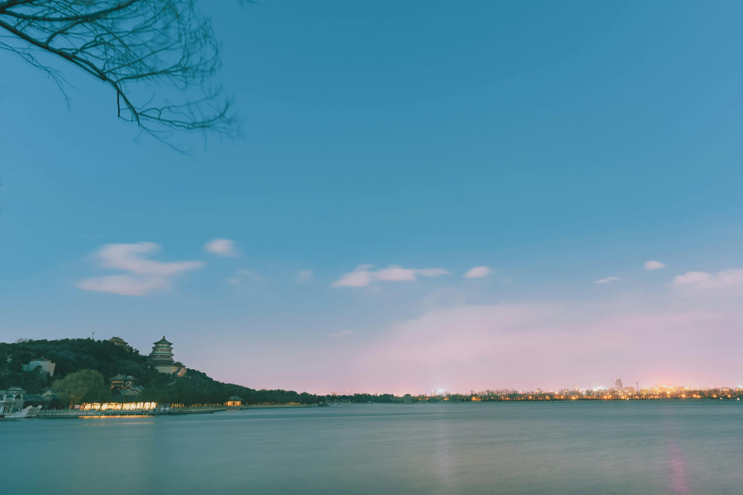 Kunming city skyline at sunset with modern buildings and warm evening light