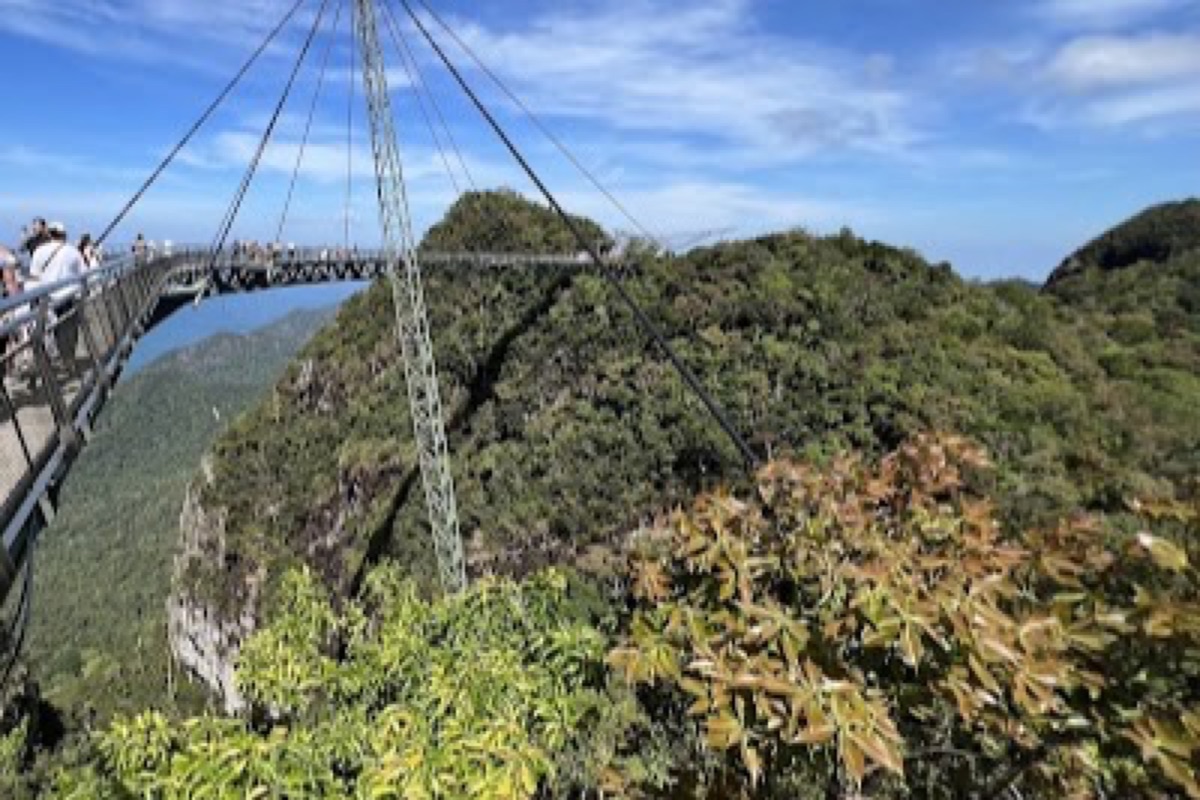 Langkawi Sky Bridge curving above the treetops with the Andaman Sea archipelago below