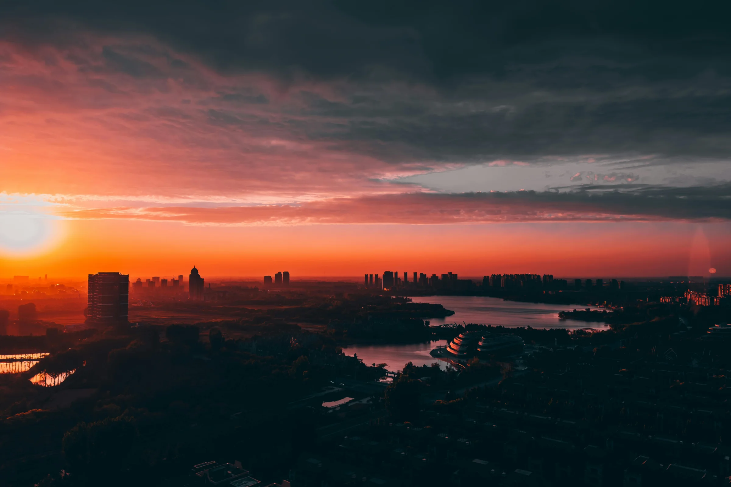 Panoramic sunset view of Lanzhou skyline along the Yellow River, China