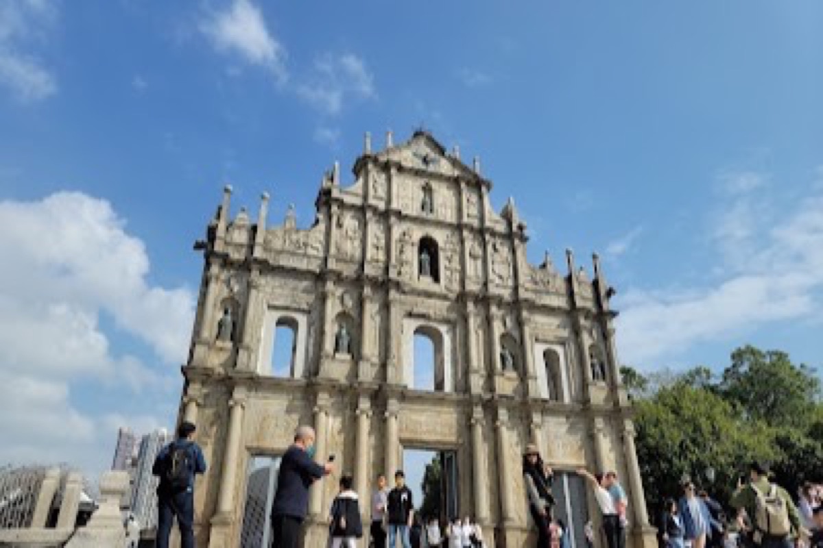 Ruins of St. Paul's baroque stone facade above granite steps in Macau