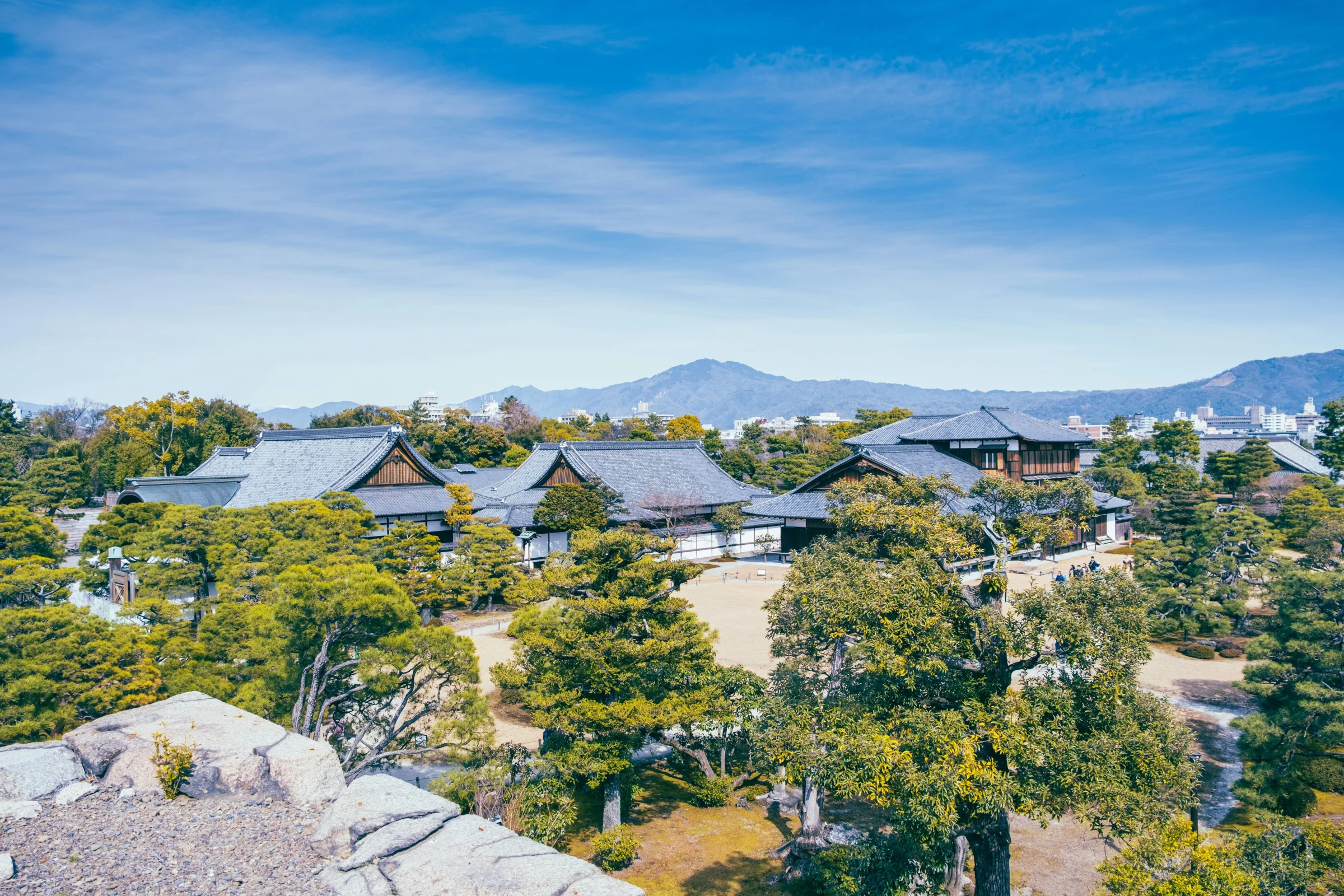 Matsumoto Castle with surrounding city and mountains in Japan