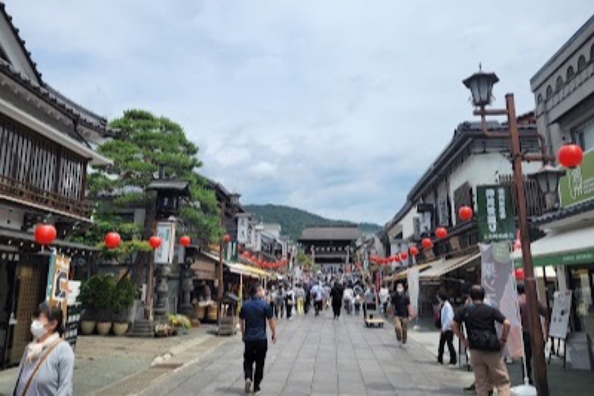 Zenko-ji Nakamise-dori approach street with soba shops and traditional storefronts in Nagano
