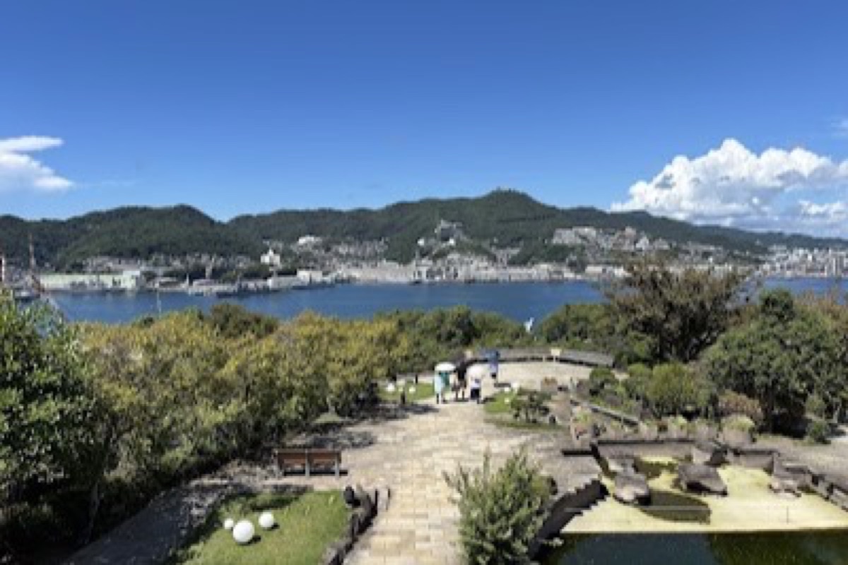 Glover Garden's historic Western-style buildings overlooking Nagasaki harbor at sunset