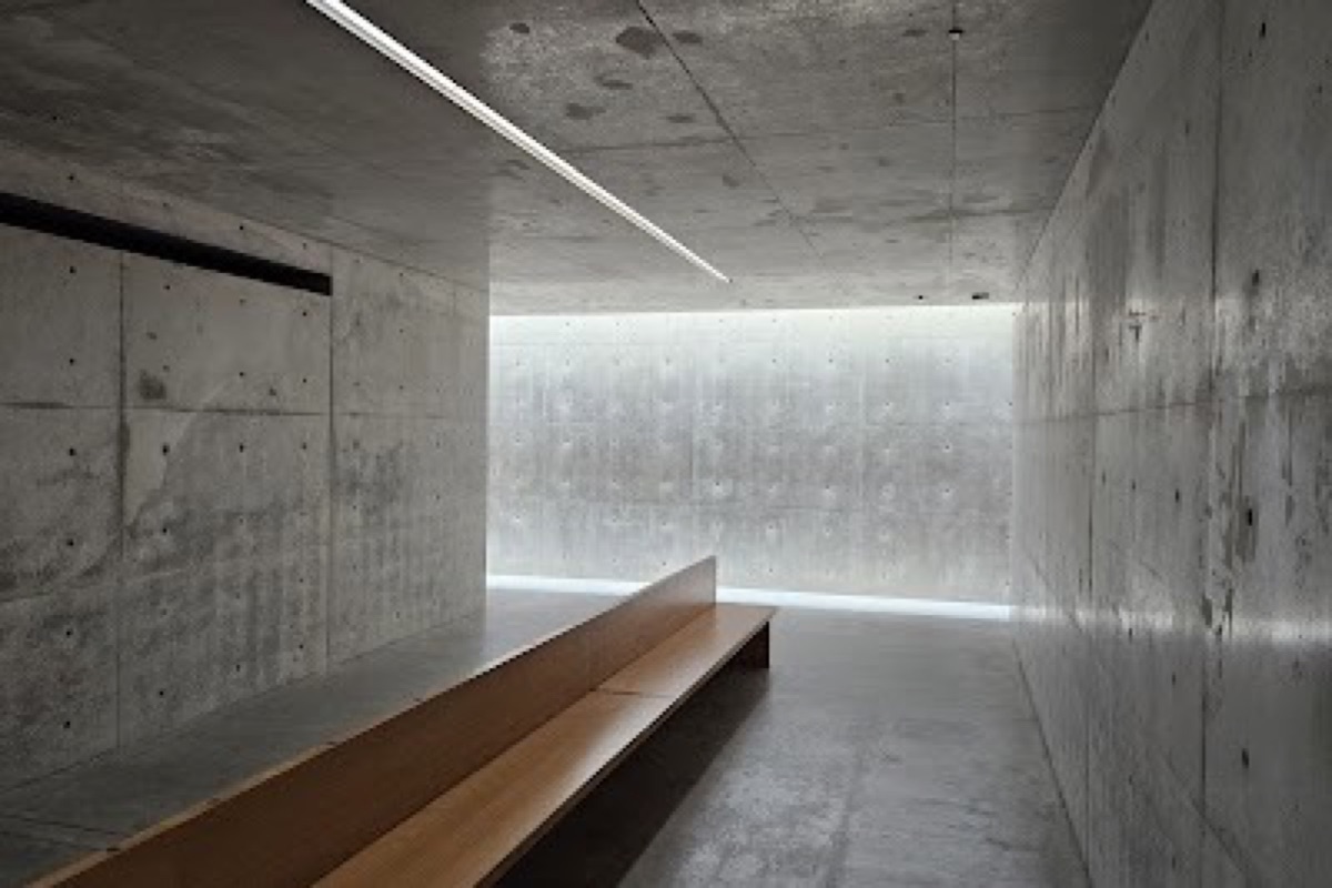 Chichu Art Museum underground concrete gallery with natural light streaming through skylights