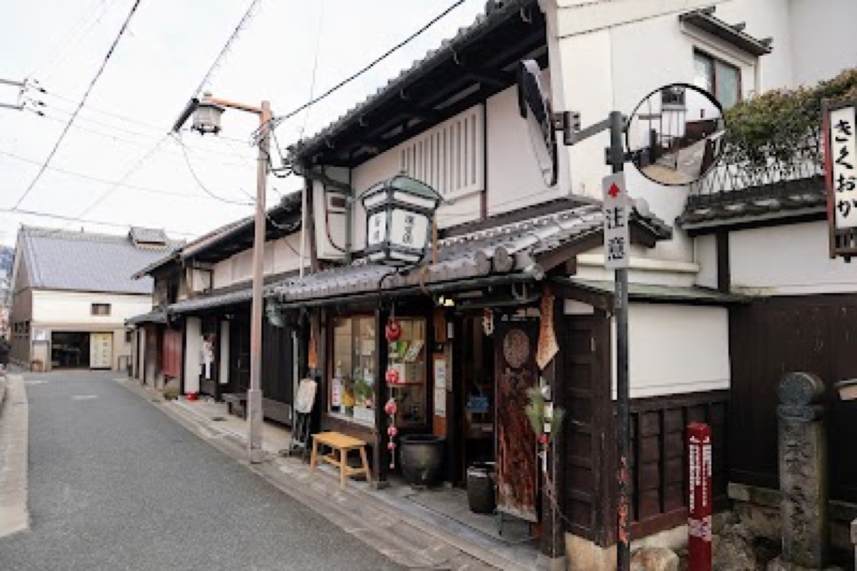 Traditional machiya townhouses along a narrow lane in Naramachi District Nara