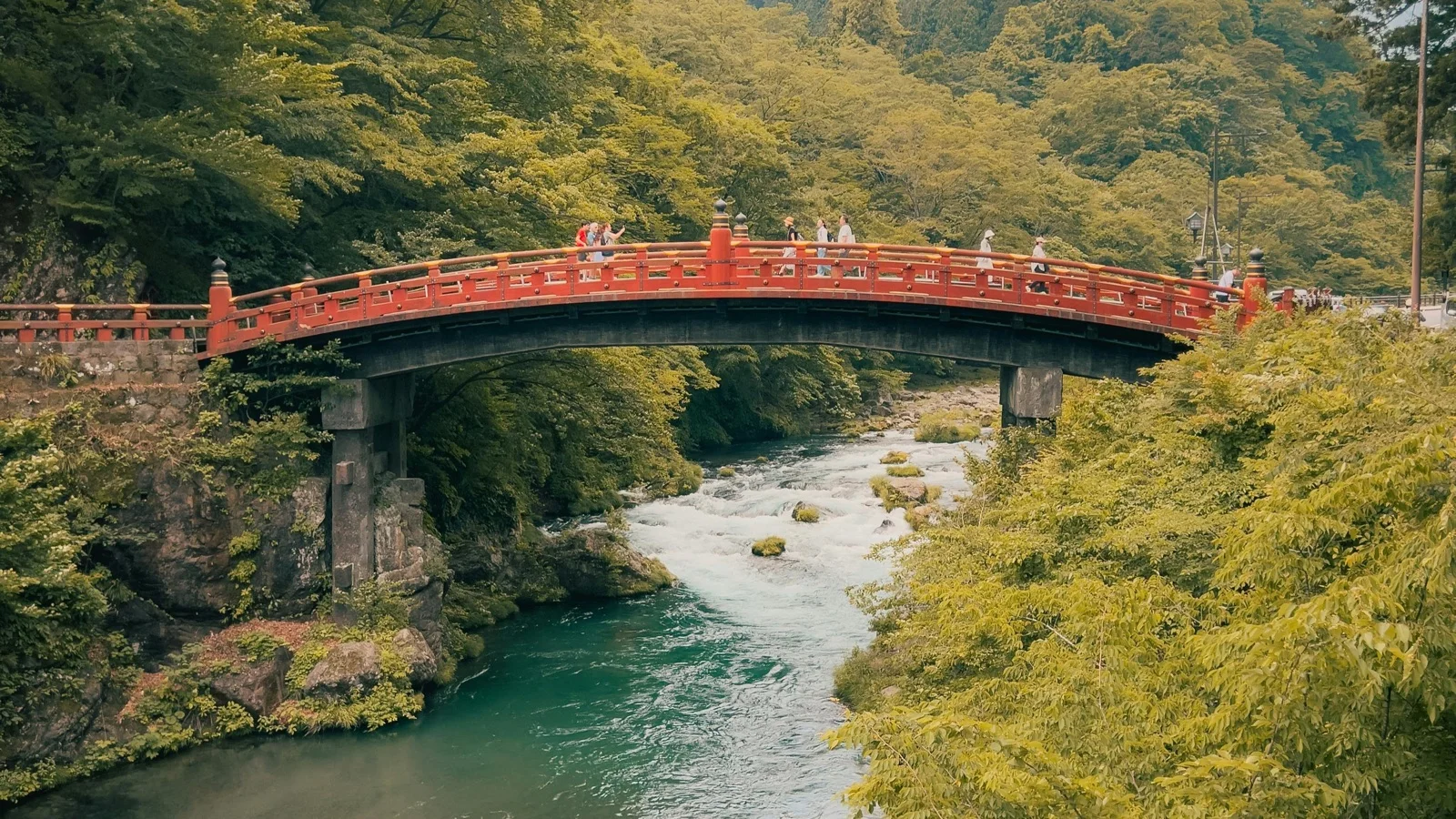 Shinkyo Bridge spanning the Daiya River gorge with autumn maples in Nikko