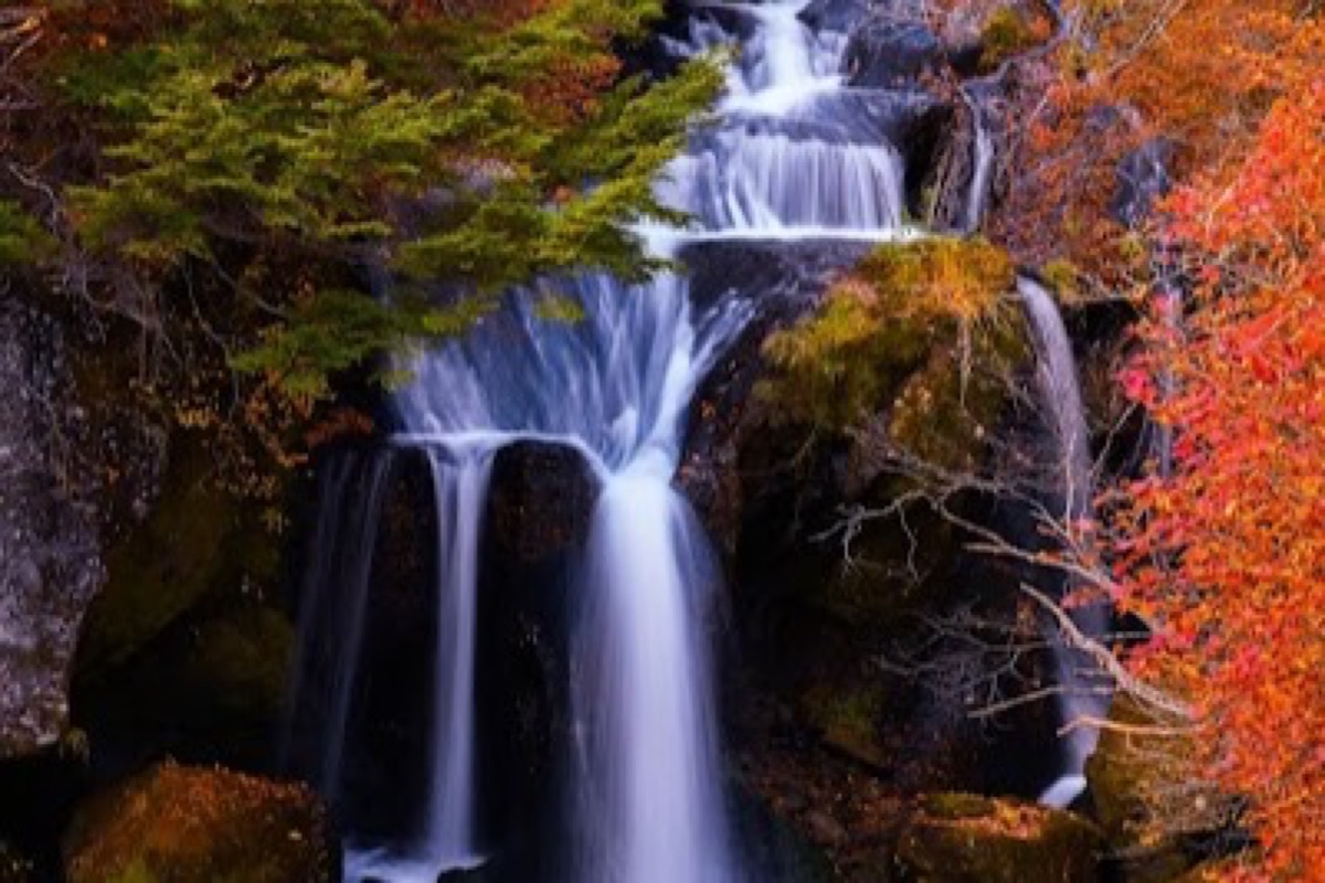 Ryuzu Falls cascading over jagged rock in dragon-head shape in Nikko