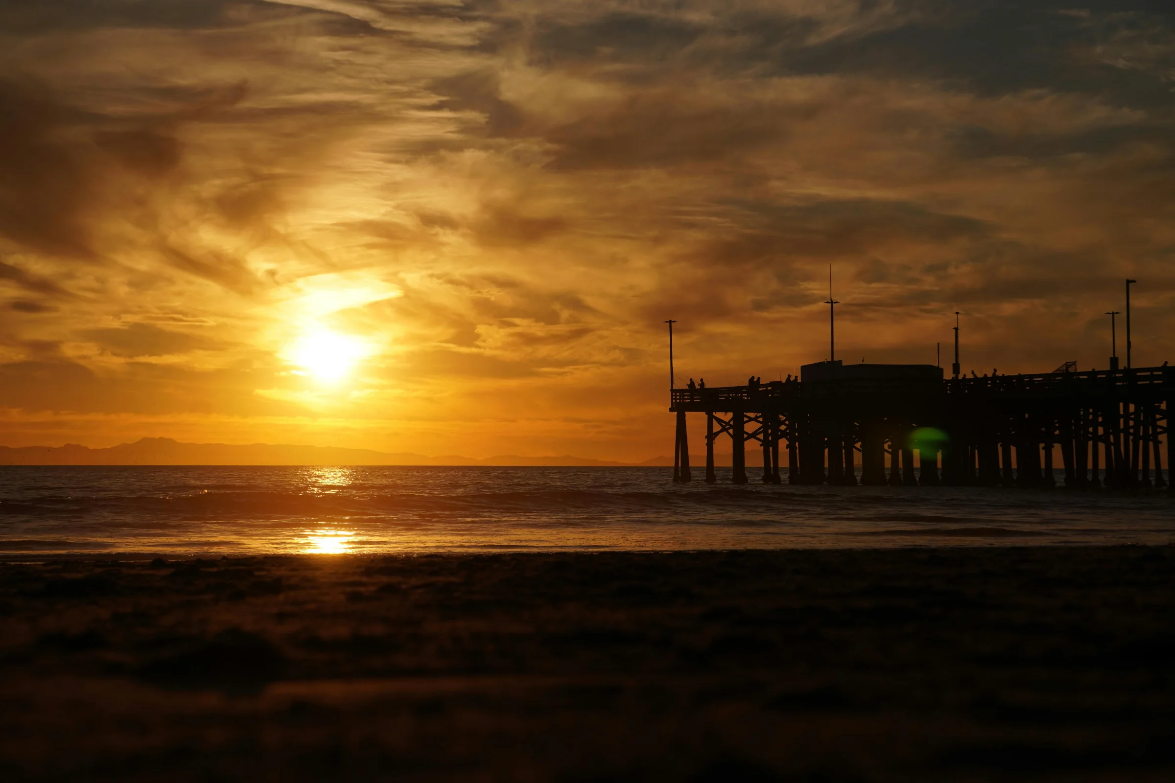 Aerial sunset view of Newport Beach coastline in Orange County, California