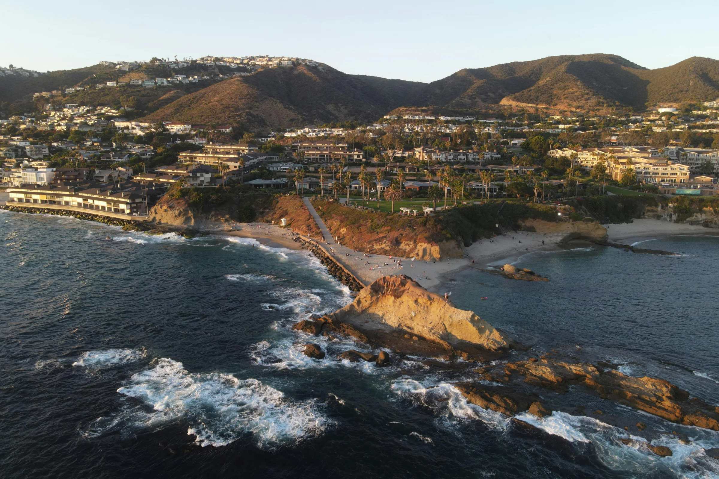 Aerial sunset view of Orange County California coastline and beaches