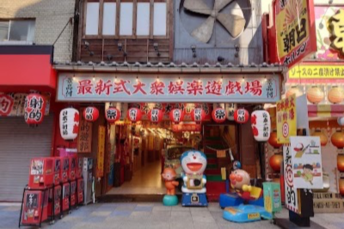 Shinsekai neon-lit streets with kushikatsu restaurants in Osaka