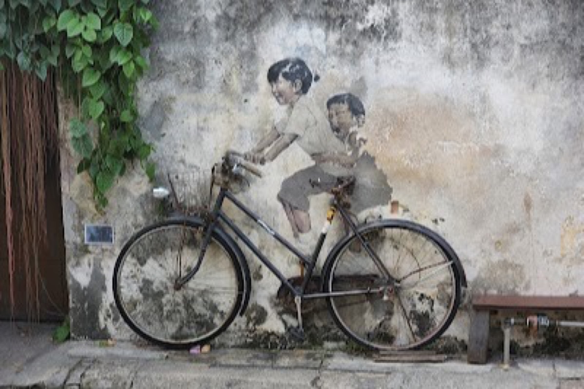 Kids on Bicycle mural painted on a heritage shophouse along Armenian Street in George Town