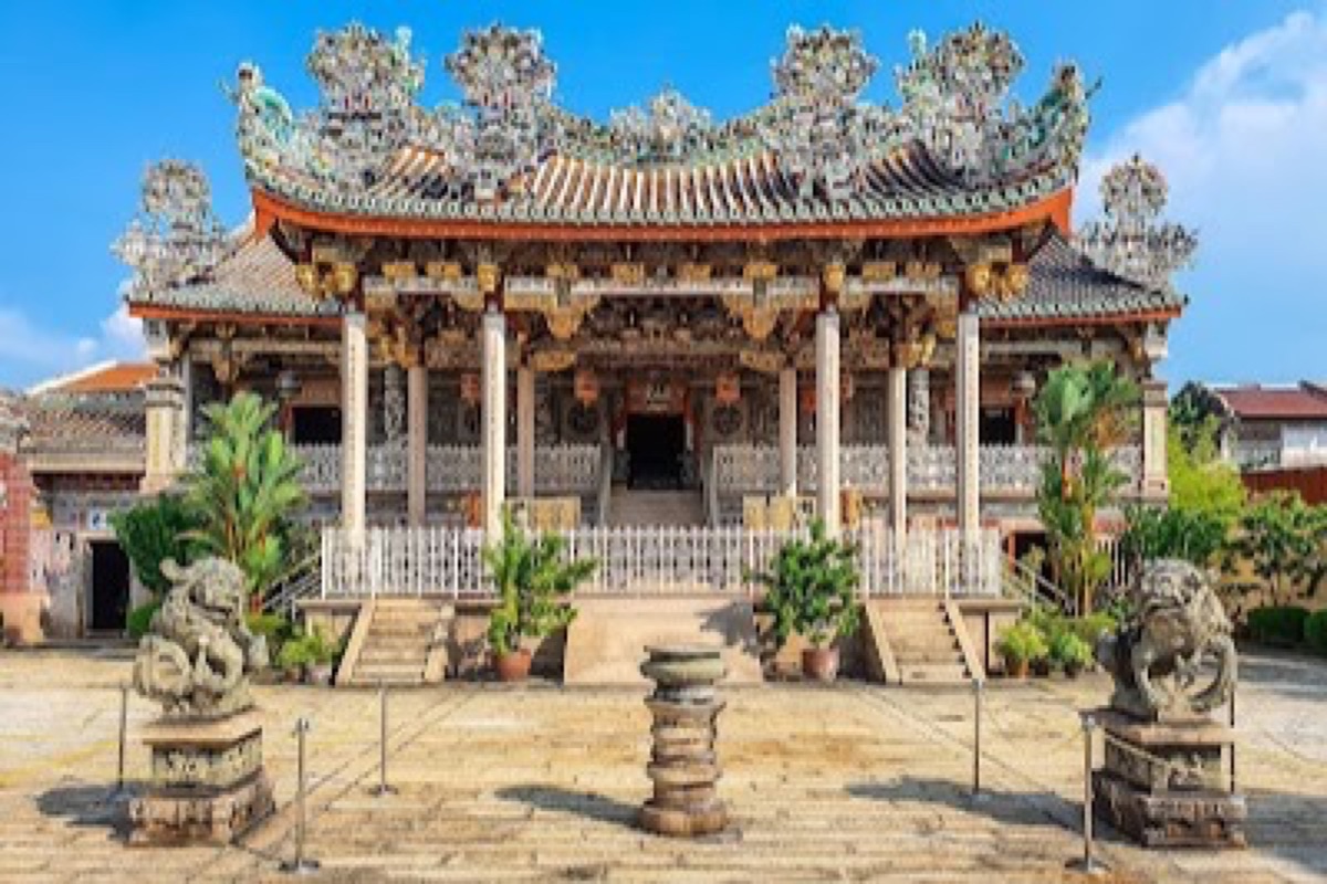 Ornate roof carvings and stonework of Khoo Kongsi clan temple in George Town