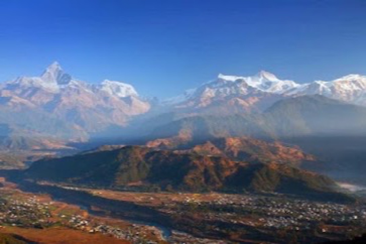 Dawn light on Machhapuchhre and the Annapurna range from the Sarangkot viewpoint