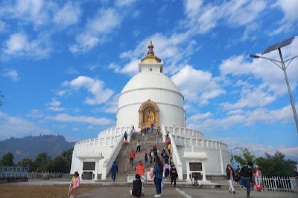 White World Peace Pagoda on its forest ridge above Phewa Lake