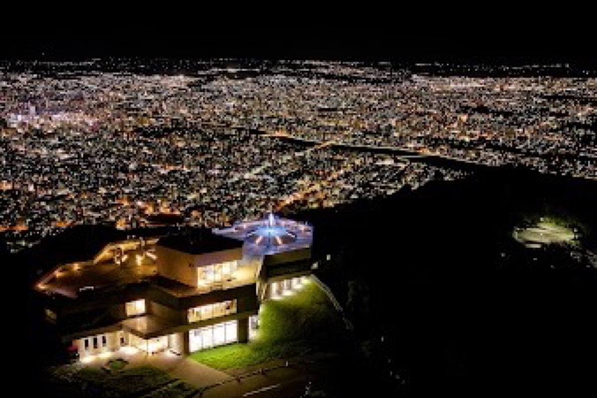 Night view of Sapporo city lights from Mt. Moiwa observation platform in winter