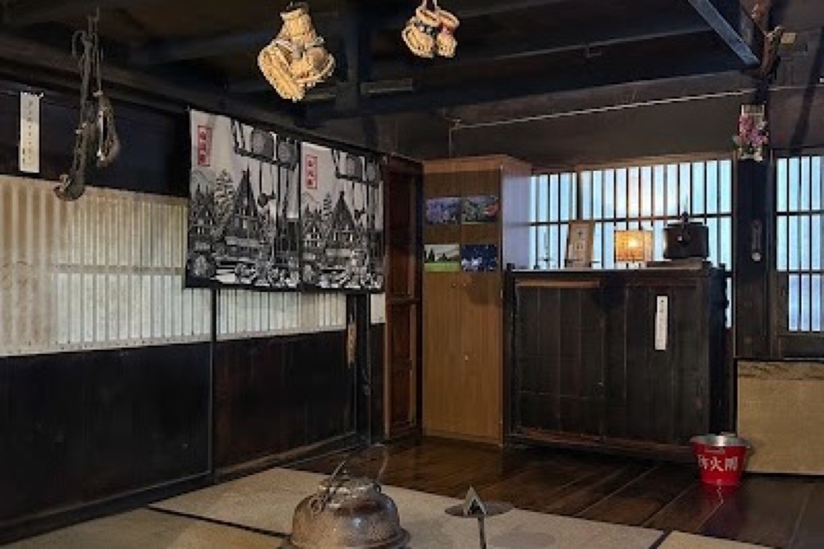 Nagase House five-story gassho-zukuri farmhouse with steep thatched roof in Shirakawa-go