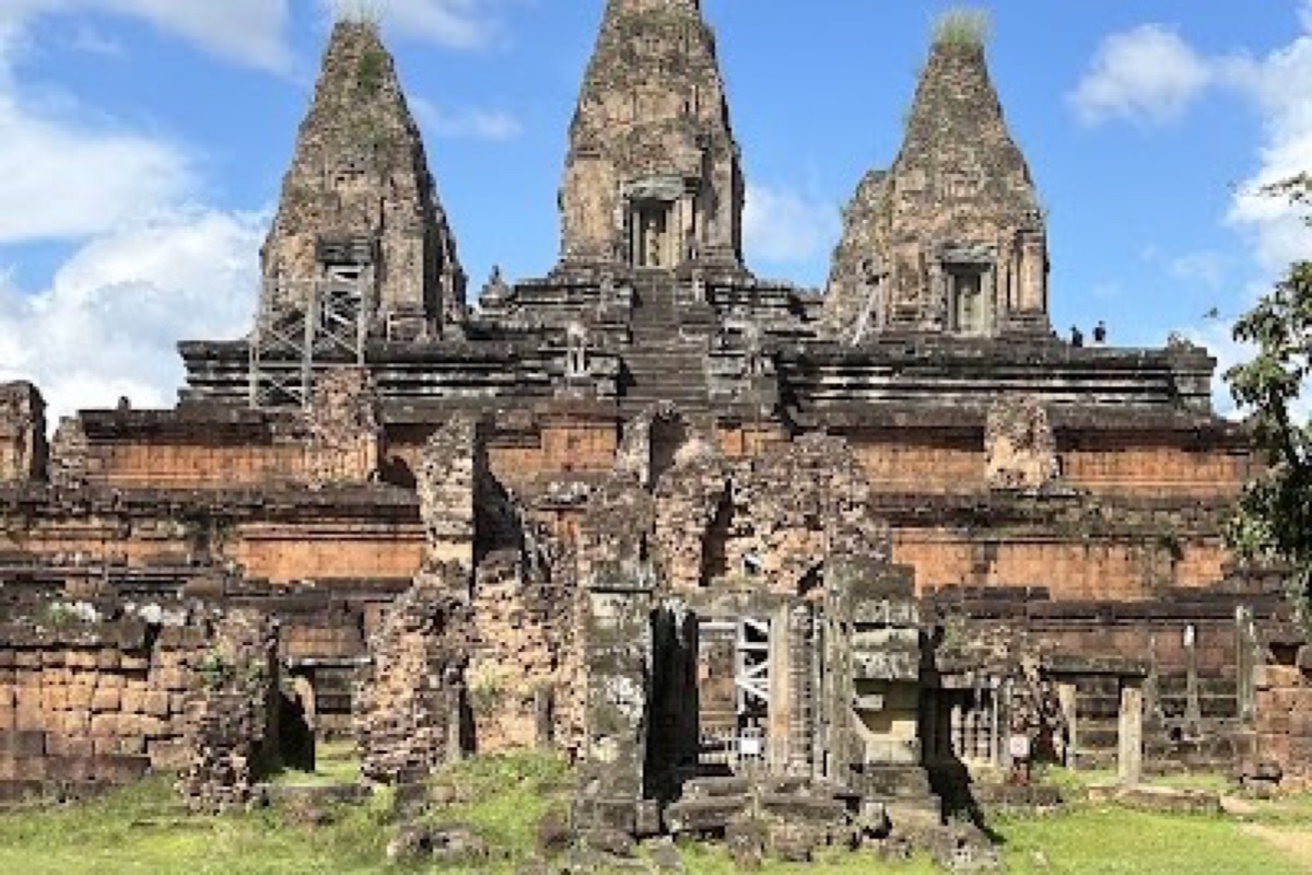 Pre Rup temple terraces glowing at sunset over the Angkor plain