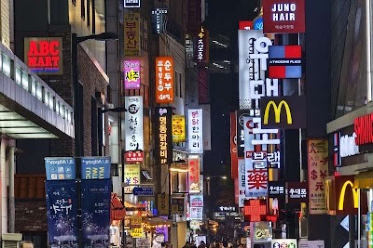 Myeongdong Street Food Alleys neon signs and night food stalls in Seoul