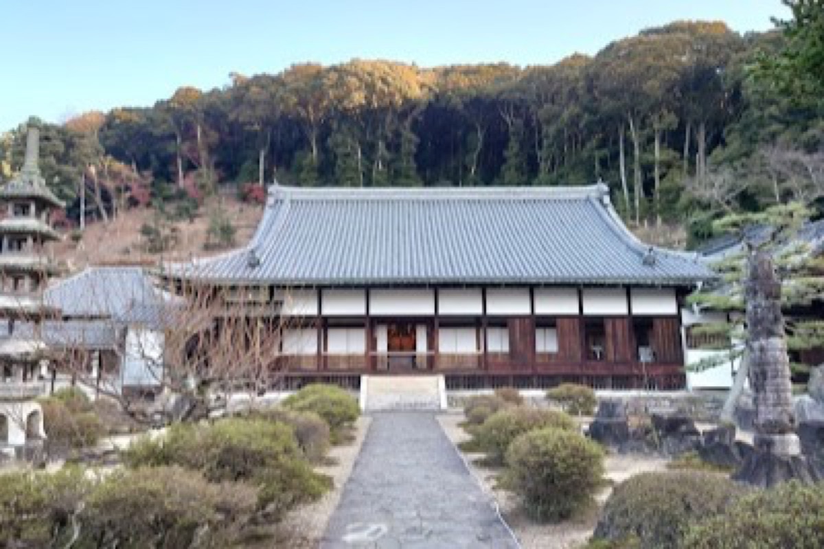 Koshoji Temple steep stone approach lined with autumn maple trees in Uji