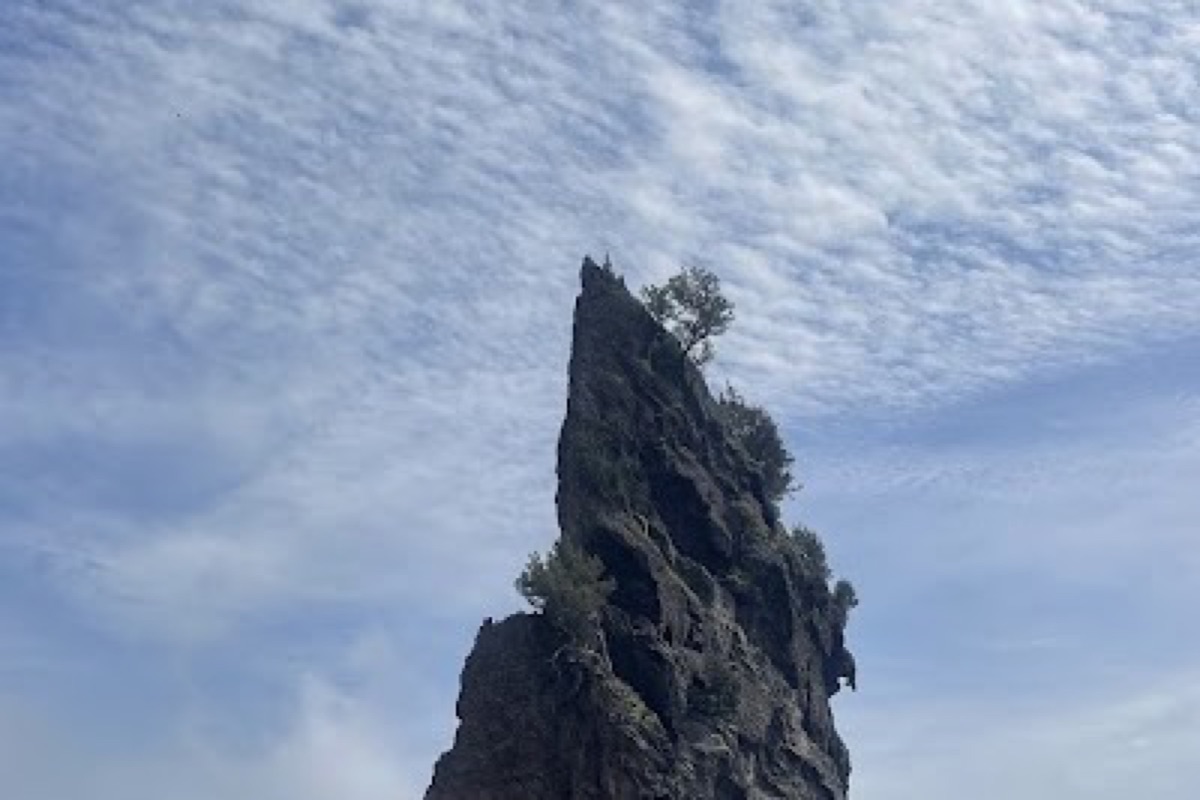 Tonggumi Beach black pebble cove with translucent water on the west coast of Ulleungdo