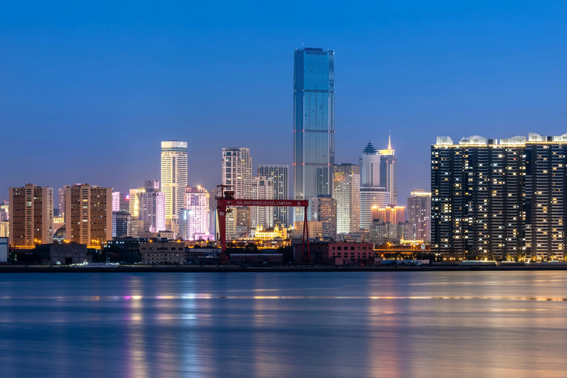 Wenzhou city skyline and riverfront at dusk in Zhejiang, China