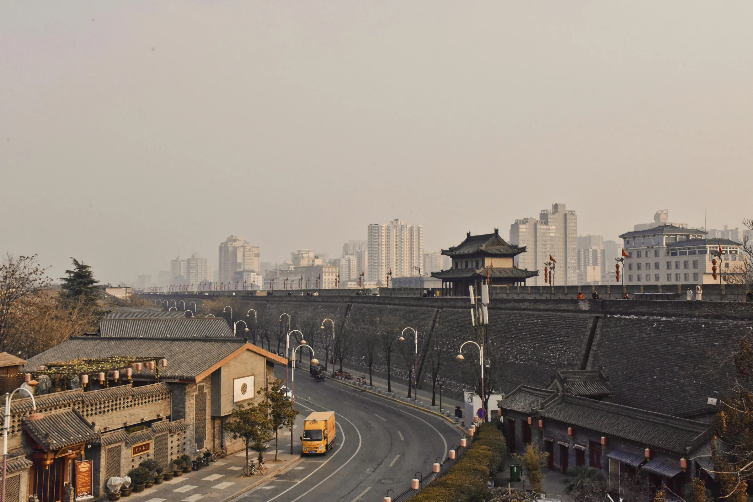 Sunset view of Xi'an city wall with skyline in the background
