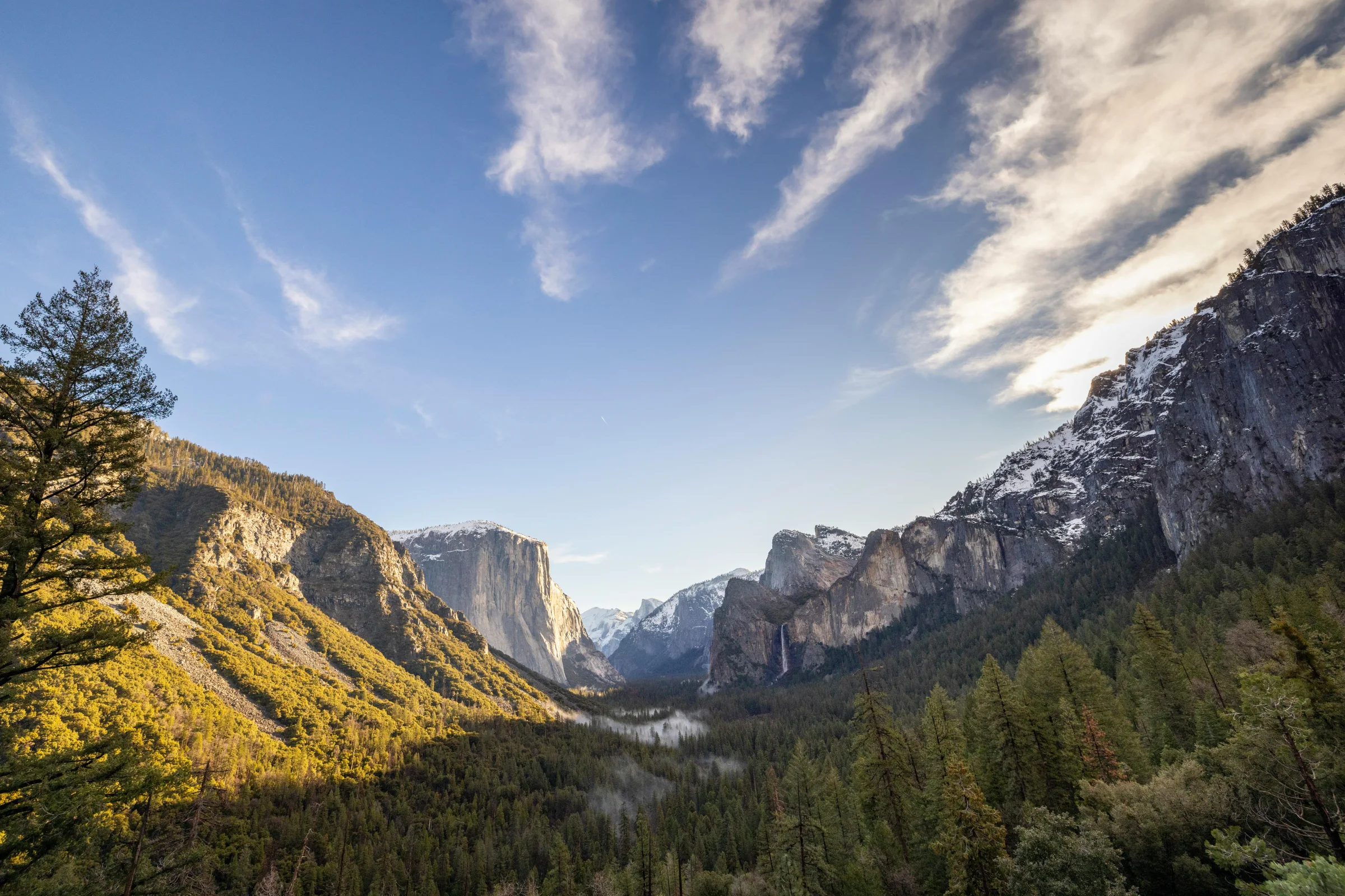 Sunrise over Yosemite Valley with El Capitan granite cliffs in Yosemite National Park, California