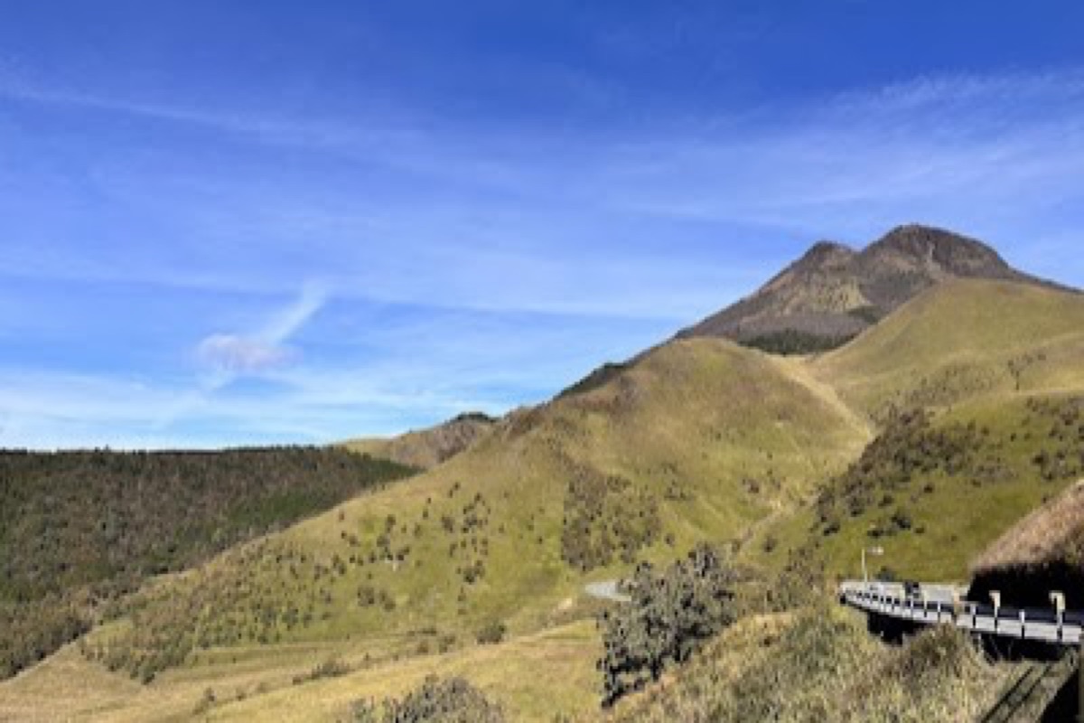Mount Yufu twin peaks rising above the Yufuin basin with panoramic trail views